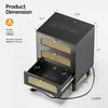 A black nightstand with rattan drawer fronts and gold accents, shown with dimensions and weight capacity. Voir les images du produit