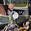 Collage of images showing children in car seats with sunshades on the car windows. Produktbild-Vorschau
