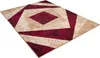 A rectangular rug with a geometric pattern is shown from a diagonal angle on a white background. Anteprima dell’immagine prodotto