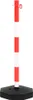 A red and white striped stanchion with a black base, isolated on a white background. Náhľad obrázku produktu