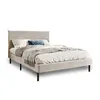 A bed with bedding and pillows, isolated on a white background. Voir les images du produit