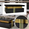 A modern black and gold coffee table is shown in a living room setting, with close-up views highlighting its design. Anteprima dell’immagine prodotto