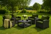 Outdoor furniture set on a grassy lawn with trees in the background. Produktbild-Vorschau