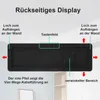 A diagram showing the back of a digital wall clock with labels indicating mounting holes, a keypad area, and cable management. Produktbild-Vorschau