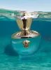A Versace perfume bottle submerged in clear blue water. Anteprima dell’immagine prodotto