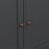 A close-up view of two brass knobs on a dark gray cabinet. Produktbild-Vorschau