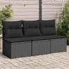 A three-seater outdoor sofa with black cushions is shown on a paved patio, with a wooden fence and plants in the background. Náhľad obrázku produktu