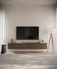 A modern living room setup with a wall-mounted TV board and a floor lamp. Produktbild-Vorschau