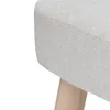 A close-up view of the textured fabric and wooden leg of a stool. Náhled obrázku produktu