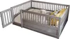 A grey wooden toddler bed with a gate and railing, shown from an elevated angle against a white background. Voir les images du produit