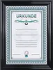 A framed certificate with decorative borders and text. Produktbild-Vorschau
