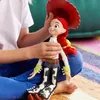 A child is holding a Toy Story Jessie doll. Podgląd zdjęcia produktu