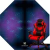 A red and black gaming chair is shown against a dark, abstract background with hexagonal patterns. Náhled obrázku produktu