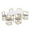 A dining table with six chairs, arranged on a white background. Anteprima dell’immagine prodotto