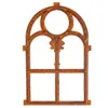 A rusted metal window frame with a gothic arch design. Produktbild-Vorschau