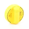 A yellow cap with warning symbols and text. Náhled obrázku produktu