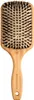 A close-up studio shot of a hairbrush. Podgląd zdjęcia produktu
