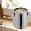 A stainless steel insulated soup container is shown on a kitchen counter, with a window and plants in the background. Produktbild-Vorschau