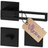 A black door handle set with a tag attached. Produktbild-Vorschau