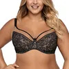 A woman wearing a black lace bra. Produktbild-Vorschau