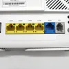 Close-up view of the rear ports of a Zyxel router. Podgląd zdjęcia produktu