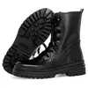 A pair of black leather lace-up boots shown from a slightly angled view, with one boot standing upright and the other lying on its side to show the sole. Produktbild-Vorschau