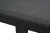 Close-up view of the corner of a black rattan-style table. Produktbild-Vorschau