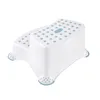 A white two-step stool with blue polka dots and blue accents on the feet. Produktbild-Vorschau