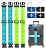 A collection of luggage straps and tags, with one strap attached to a suitcase. Podgląd zdjęcia produktu