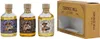 Three small bottles of liquor and a gift box. Produktbild-Vorschau