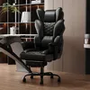 A black ergonomic office chair is shown in a modern office or home office setting. Produktbild-Vorschau
