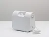 A white bathing cushion is placed on a white surface against a light gray background. Produktbild-Vorschau