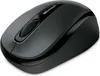 A black Microsoft wireless mouse is shown from a slightly elevated side angle on a white background. Produktbild-Vorschau