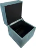 An open storage ottoman with a lid. Produktbild-Vorschau