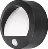 A black, circular outdoor wall light with a motion sensor. Produktbild-Vorschau