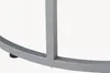 A close-up view of the metallic base of a table. Voir les images du produit
