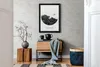 A hallway or entryway with a brick wallpaper, a framed picture, and decorative items. Náhled obrázku produktu