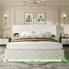 A bedroom scene featuring a tufted bed with LED lighting. Náhled obrázku produktu