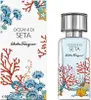 A perfume bottle and its packaging are displayed side-by-side against a white background. The packaging features a coral and floral design, and the bottle has a similar design wrapping around its base. Produktbild-Vorschau