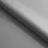 A close-up, angled view of gray fabric, likely a bed or mattress. Voir les images du produit