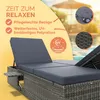 A sun lounger with cushions next to a swimming pool. Produktbild-Vorschau