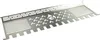A stainless steel grill accessory with a cut-out logo and patterned perforations, presented against a white background. Produktbild-Vorschau