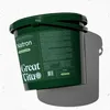 A dark green bucket of Natron powder is shown at an angle against a textured white and light gray background, with a shadow cast to the right. Produktbild-Vorschau