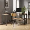 A home office setup with a corner desk, computer, chair, and plants. Anteprima dell’immagine prodotto
