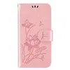 A pink phone case with a lotus and dragonfly design. Produktbild-Vorschau