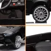 A collage of four close-up images of a black Mercedes CLS350 electric ride-on car for children. Produktbild-Vorschau