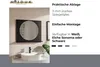A bathroom vanity with a round mirror mounted on the wall above a sink. The mirror has a black frame and a small shelf below it. Text on the right describes the product's features. Podgląd zdjęcia produktu