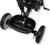 Close-up view of a black tricycle's basket and wheels. Produktbild-Vorschau