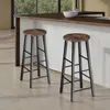 Two bar stools are placed in front of a kitchen island with a window in the background. Náhled obrázku produktu