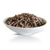 A white bowl filled with brown pellets, likely animal feed, on a white background. Produktbild-Vorschau